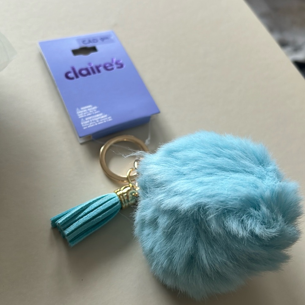 Blue pompom and suede key chain
